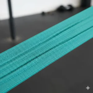 A close-up view of the durable and snap-resistant fabric texture of high-quality latex free exercise bands.