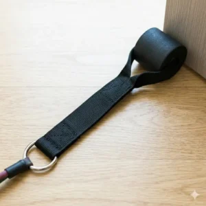 A heavy-duty door anchor from a set of attachments for resistance bands secured in a door frame.