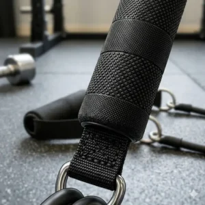 2. Close-up illustration of the non-slip rubber texture on a professional-grade exercise handle for a secure workout grip.