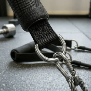 3. A detailed view of a stainless steel D-ring on exercise handles, showing how to securely clip them to cable machines.