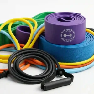 A collection of bright rubber resistance tubes and monster bands for full-body home workouts.